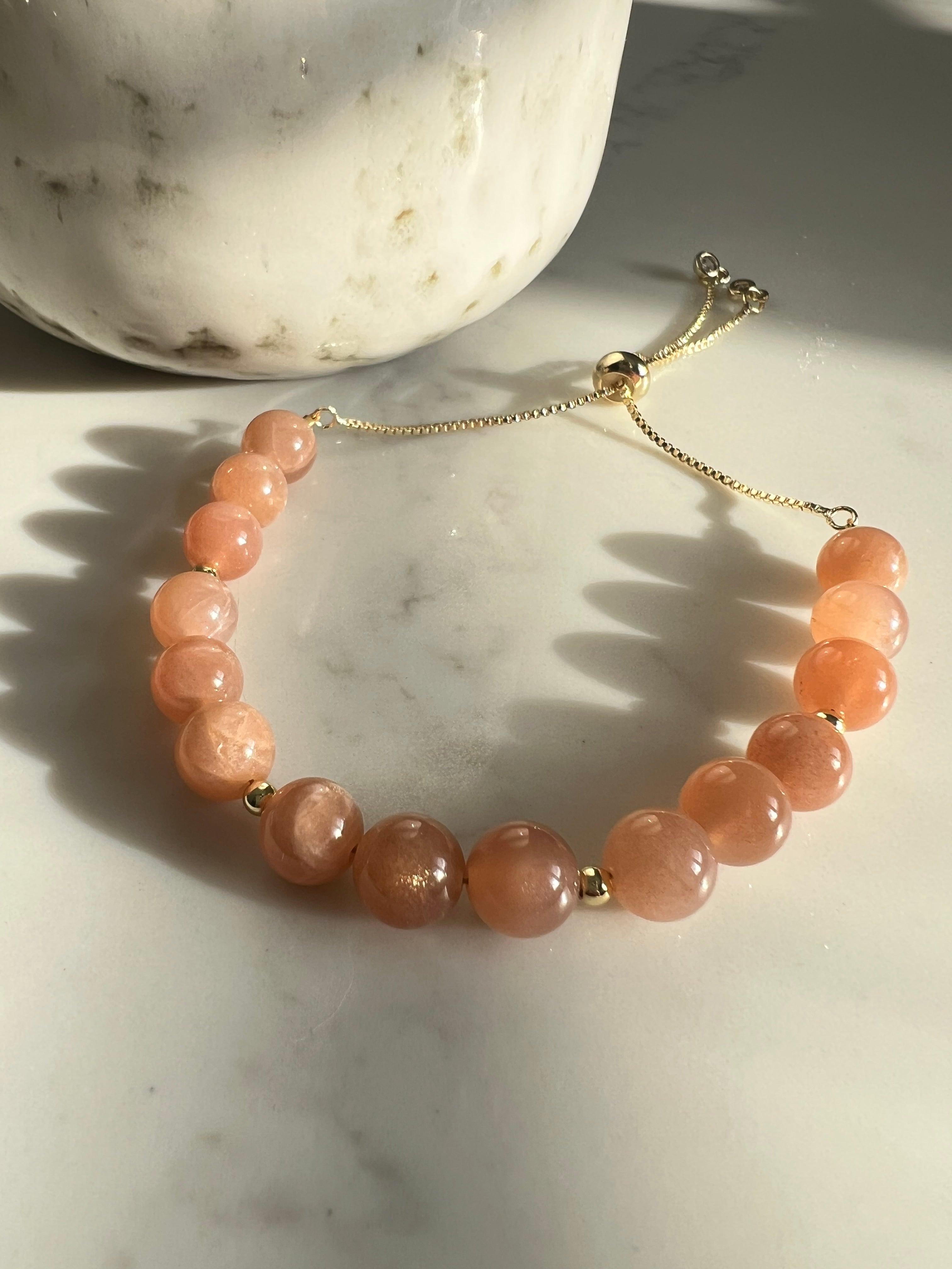 Peach Sunstone Bracelet with Gold Beads & Adjustable Slider Fastening